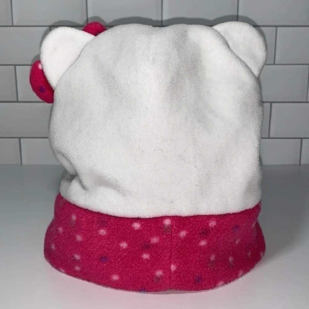 Hello Kitty youth fleece hat with polka dots & bow.  100% polyester. ‎ GUC
